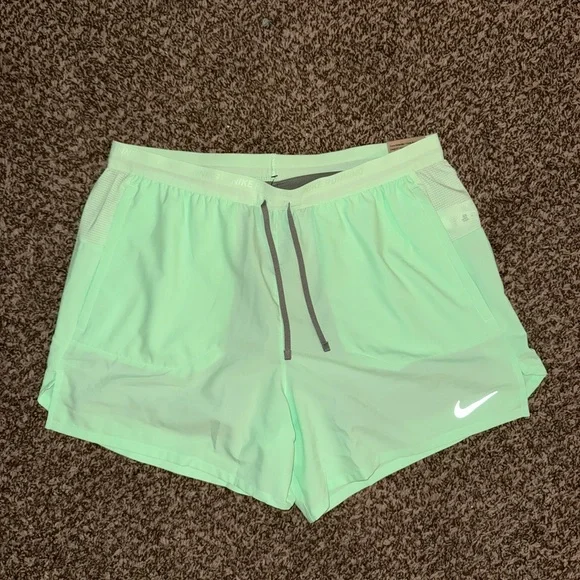 Nike Stride Light Green Shorts - Picture 1 of 5